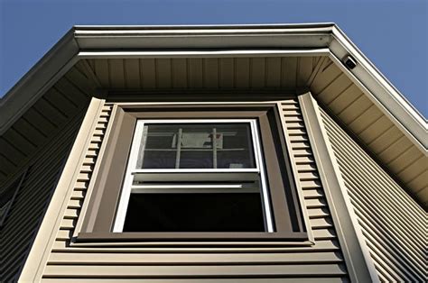 exterior house metal window decor|light brown exterior window trim.